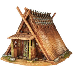 A 28mm scale 3D printed model of a Chigi-Minka, an ancient Japanese dwelling. The structure is characterized by a steep A-frame thatched roof topped with prominent crossed wooden finials (Chigi) and horizontal logs (Katsuogi). It features a sheltered entrance with timber pillars, rustic wooden doors, and a stone-lined foundation, reflecting a high-status or spiritually significant historical residence.