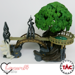 A fully assembled and painted 3D print of the Elven Whisperwood Bridge, showing a large tree with a lookout platform connected by an ornate bridge to a stone pillar with a white spiral staircase.