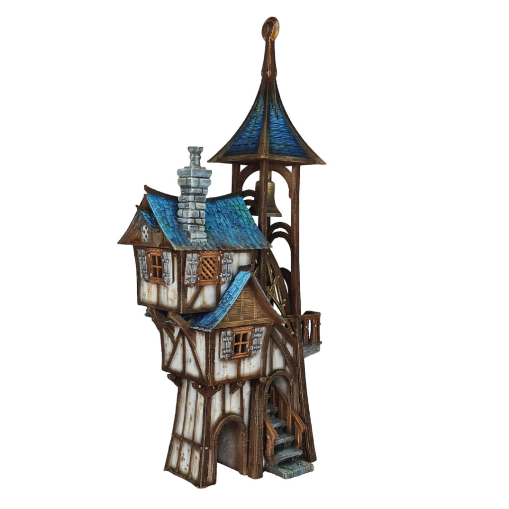 3D printed and painted model of Parson's Lodge, a tall medieval fantasy bell tower with half-timbered walls, blue shingled roofs, stone chimney, and wooden stairs.