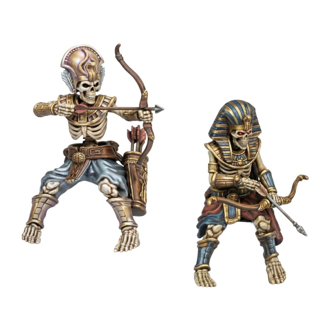 3D painted render of a skeletal camel miniature featuring ancient Egyptian-style armor, a scarab saddle, and tattered banners on a desert base