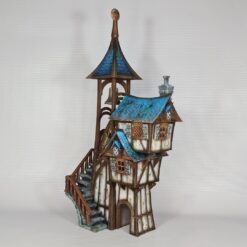 3D printed and painted model of Parson's Lodge, a tall medieval fantasy bell tower with half-timbered walls, blue shingled roofs, stone chimney, and wooden stairs.